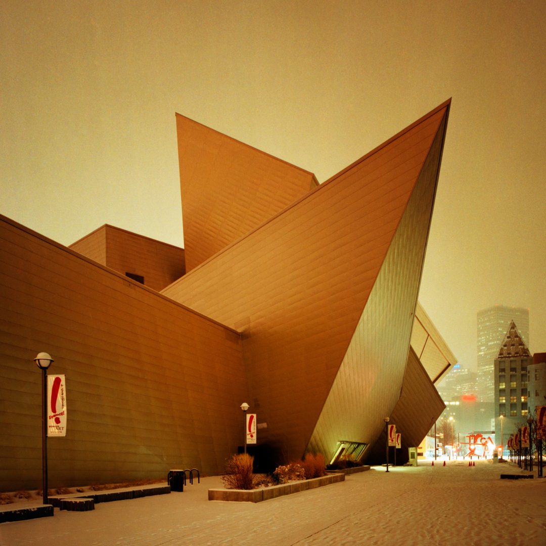 Denver Art Museum at night during a snowstorm