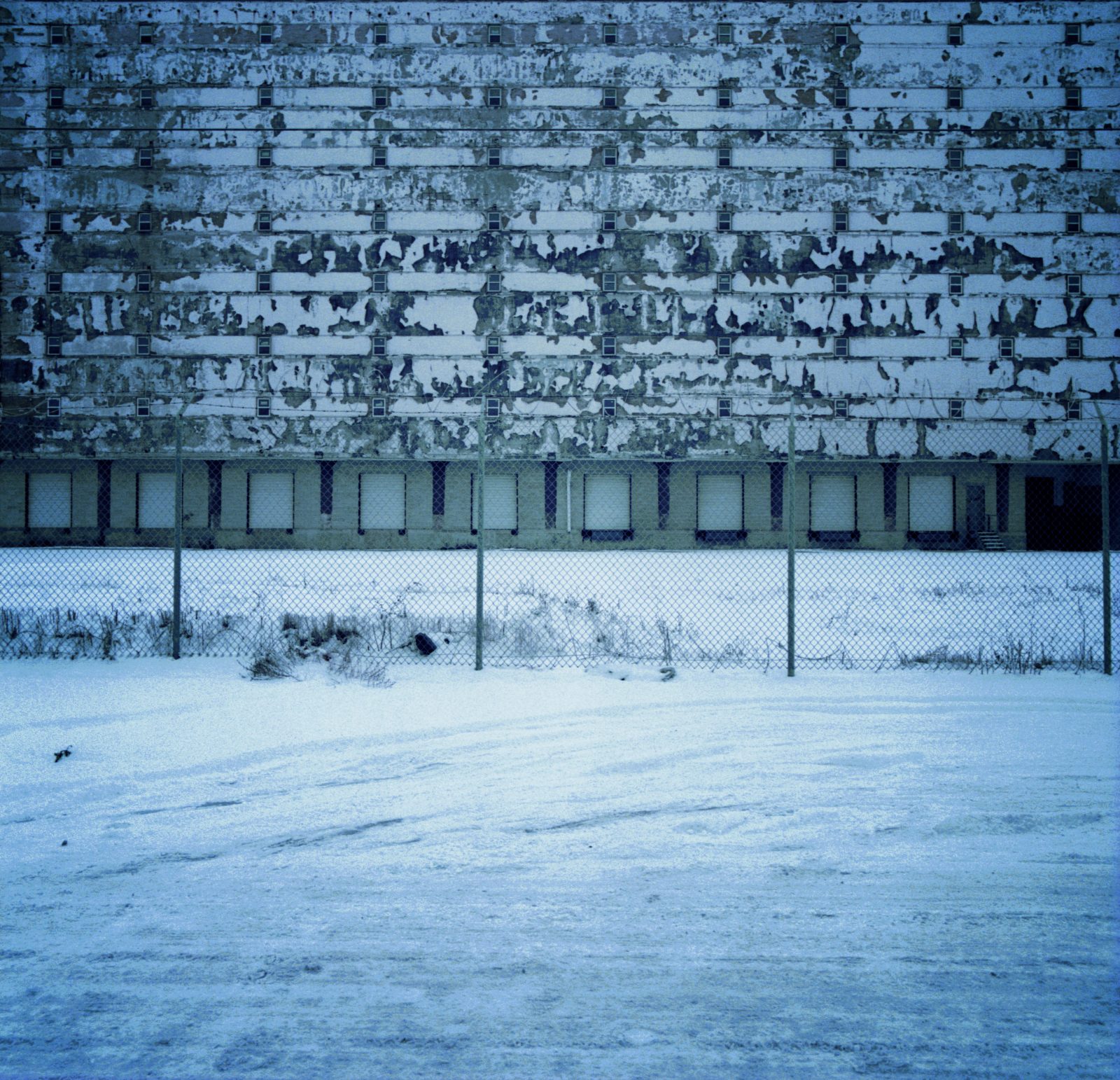 Factory wall at night. Detroit, Michigan.