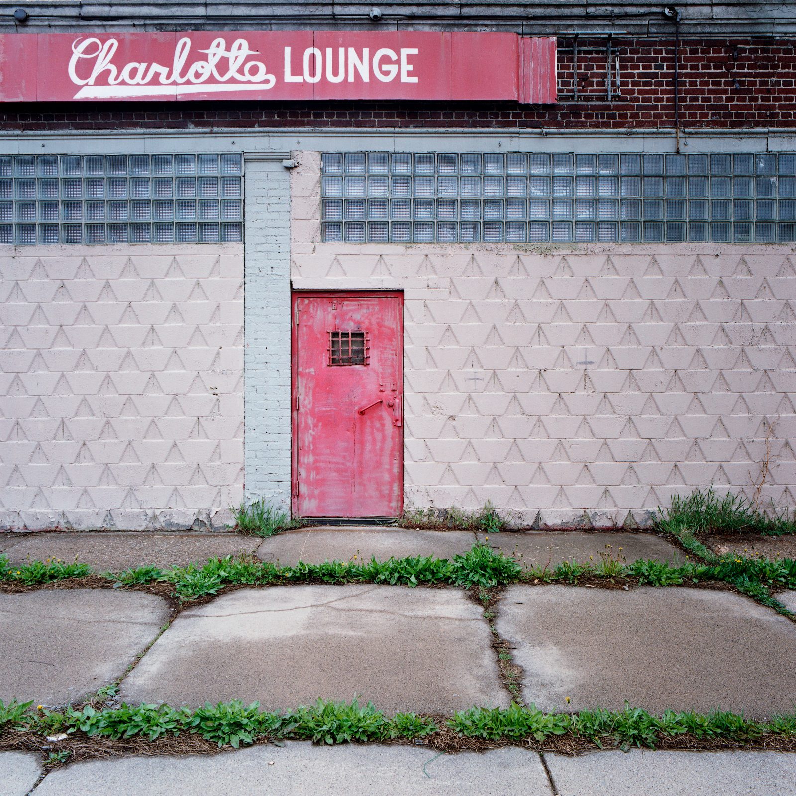 Charlotte Lounge door and sign