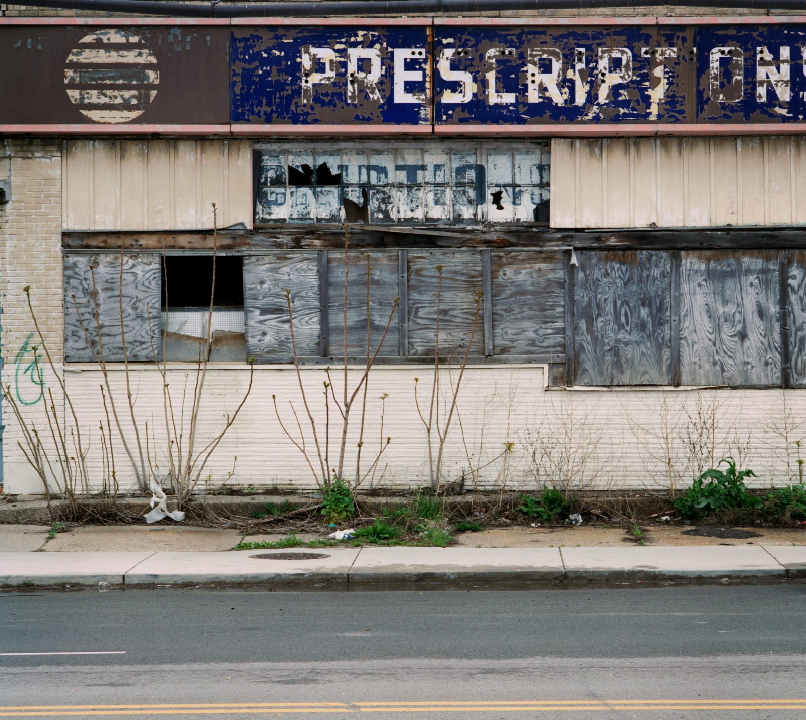 Prescriptions sign on abandoned pharmacy