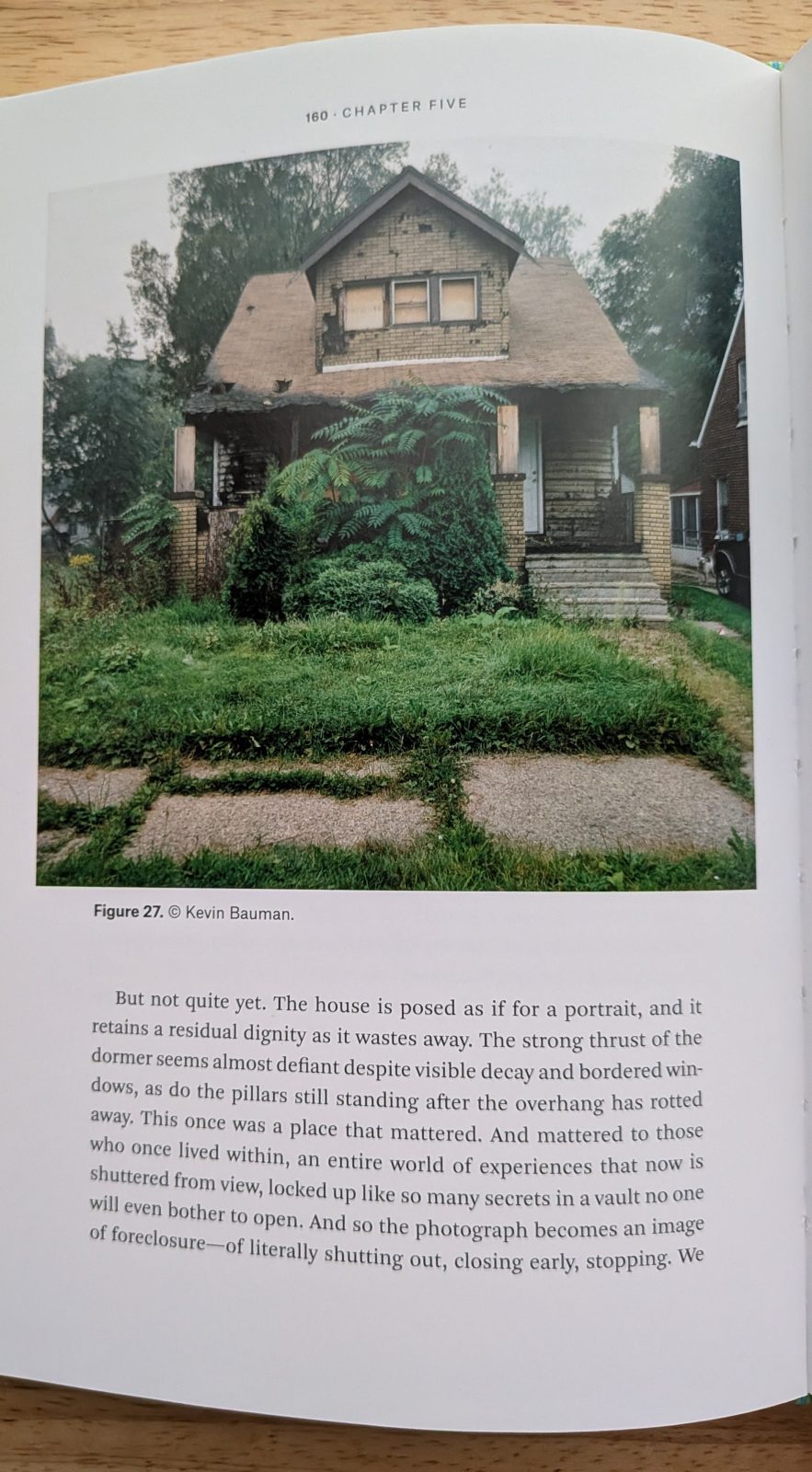 Public Image Book Page with Abandoned House Photo